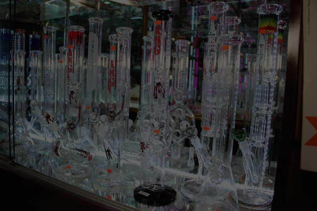 Water pipes in the glass case at Smokey News.